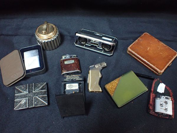 A COLLECTION OF LIGHTERS, INCLUDING ZIPPO