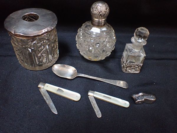 A SILVER-TOPPED SCENT BOTTLE