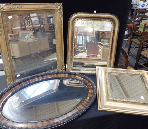 A VICTORIAN MIRROR WITH A GILDED PLASTER FRAME