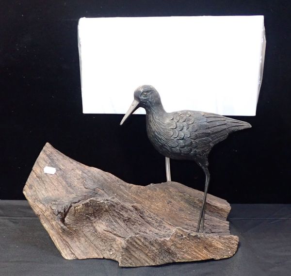 A LAMP MOUNTED WITH A CARVED ESTUARY BIRD