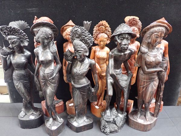 A COLLECTION OF BALINESE CARVED HARDWOOD FIGURES