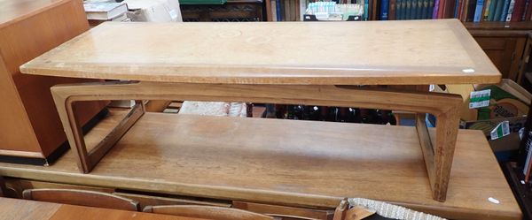 A MID CENTURY TEAK RECTANGULAR COFFE TABLE