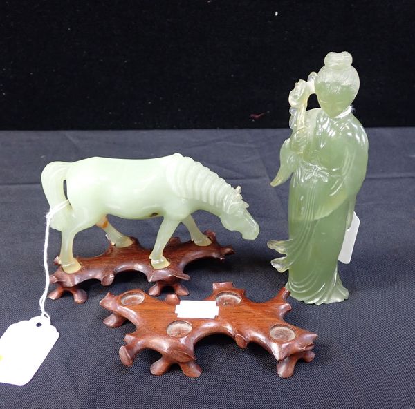 A CHINESE 'JADE' HORSE, WITH WOODEN STAND