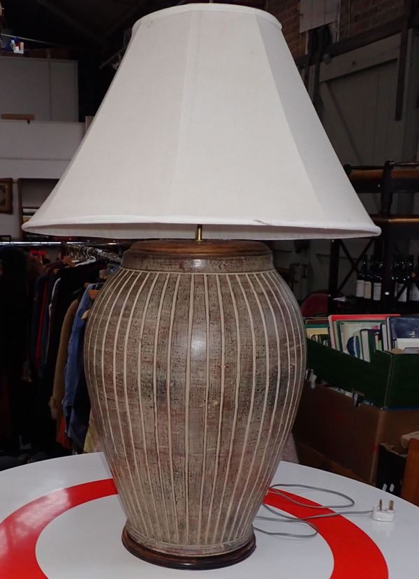 AN IMPRESSIVE POTTERY TABLE LAMP