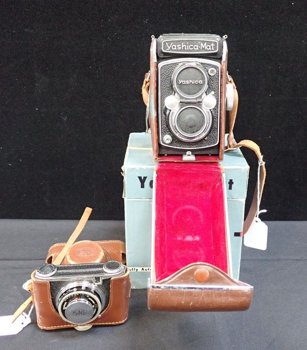 A YASHICA-MAT CAMERA IN LEATHER CASE