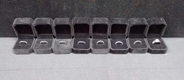 8 BOXED SILVER RINGS