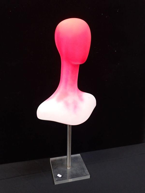 A PINK PAINTED PLASTIC DISPLAY HEAD