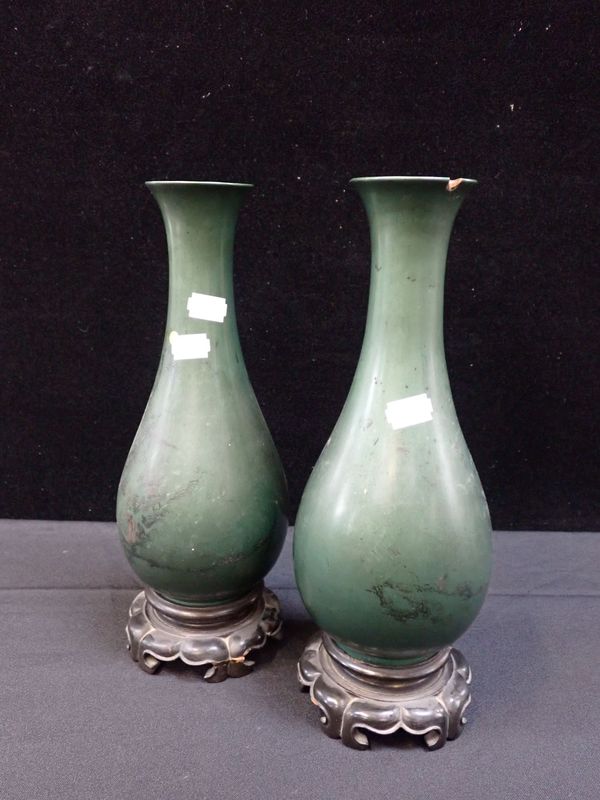 A PAIR OF CHINESE LACQUER VASES AND STANDS