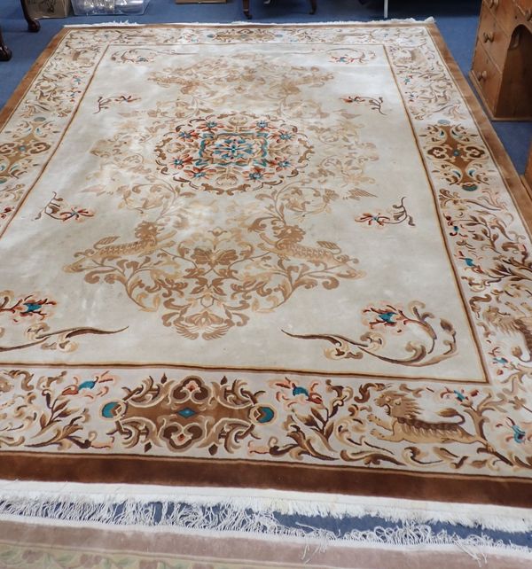 A LARGE CHINESE RUG, CREAM GROUND