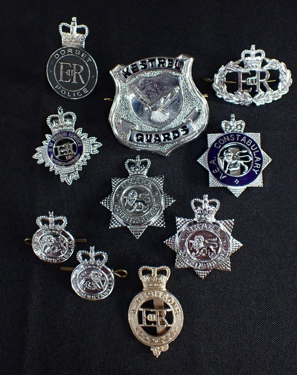 A COLLECTION OF PRISON AND POLICE BADGES