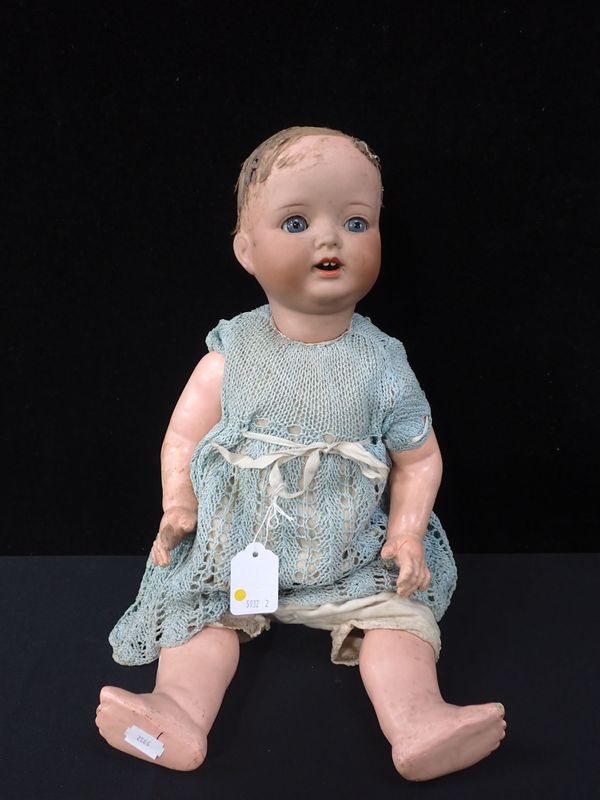 AN ARMAND MARSEILLES BISQUE-HEADED DOLL