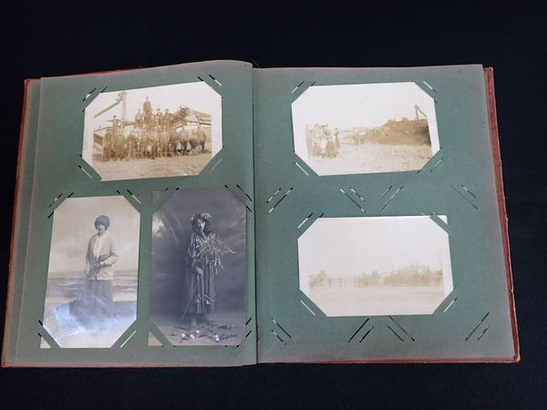 AN EDWARDIAN POSTCARD ALBUM