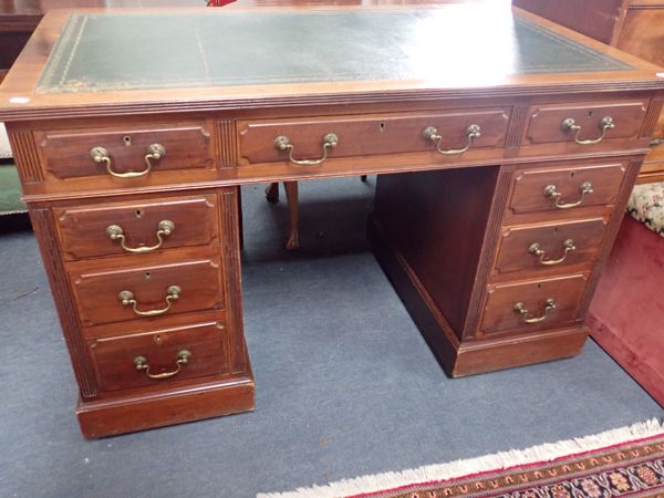 AN EDWARDIAN MAHOGANY PEDESTAL DESK