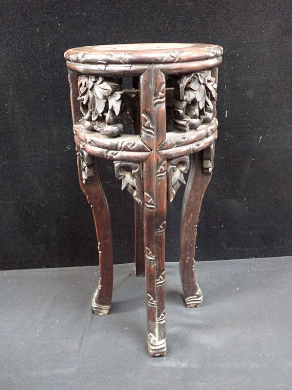 A FAR EASTERN CARVED HARDWOOD STAND