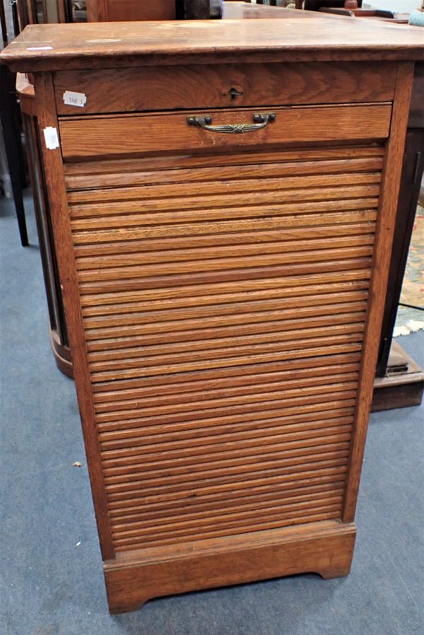 AN EARLY 20TH CENTURY OAK TAMBOUR-FRONT FILING CABINET