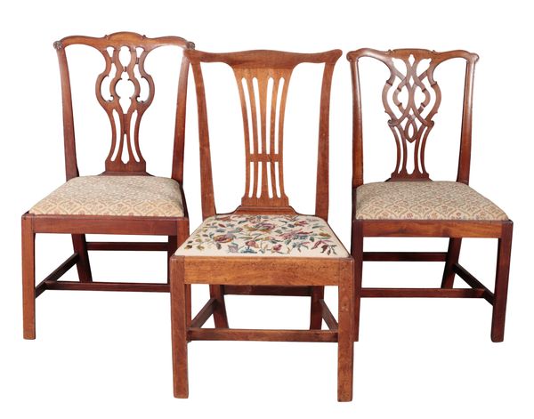 AN ASSOCIATED GROUP OF THREE GEORGE III MAHOGANY DINING CHAIRS