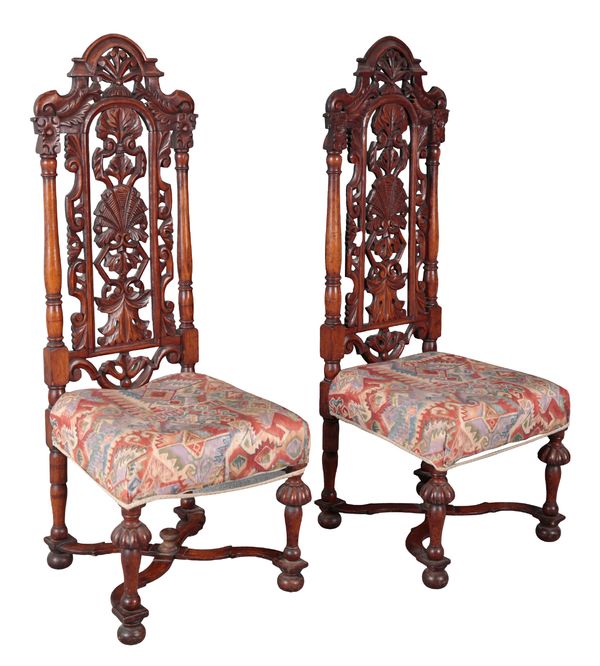 A PAIR OF VICTORIAN OAK HALL CHAIRS