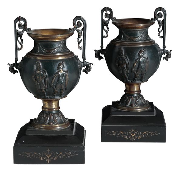 A PAIR OF 19TH CENTURY BRONZE AND PARCEL GILT GARNITURE URNS