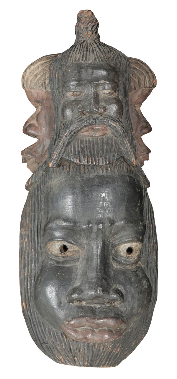 A POLYNESIAN CARVED AND PAINTED WOOD MASK