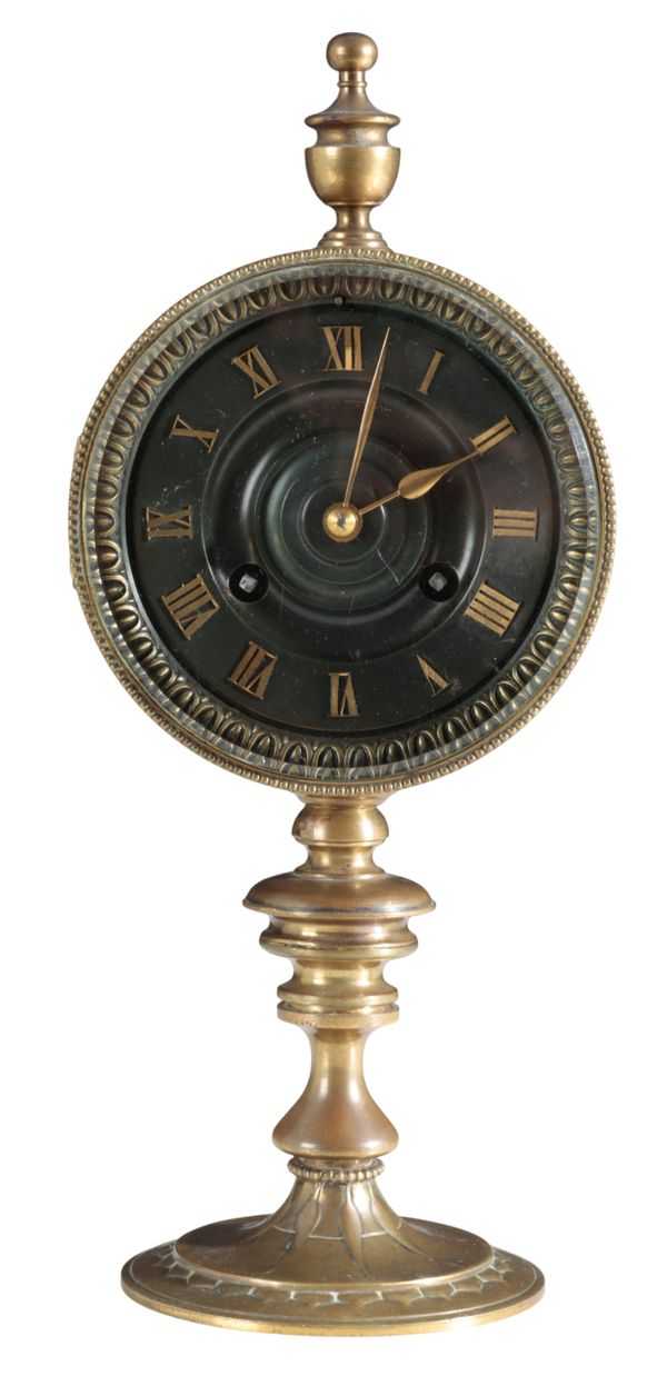 A FRENCH BRASS MANTEL CLOCK