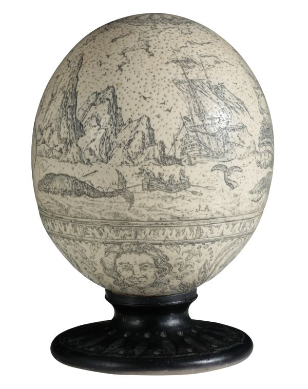 A CARVED OSTRICH EGG SCRIMSHAW