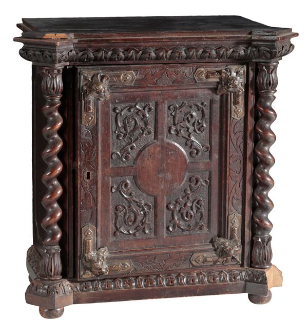 A FRENCH CARVED AND STAINED WOOD CABINET