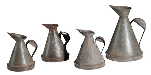 FOUR GRADUATED METAL WATER JUGS