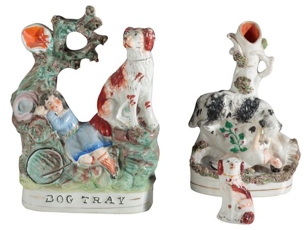 A VICTORIAN STAFFORDSHIRE POTTERY FIGURE, ‘DOG TRAY’