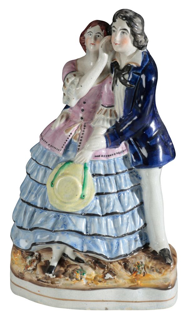 A VICTORIAN STAFFORDSHIRE PEARLWARE POTTERY FIGURE, PRINCE AND PRINCESS