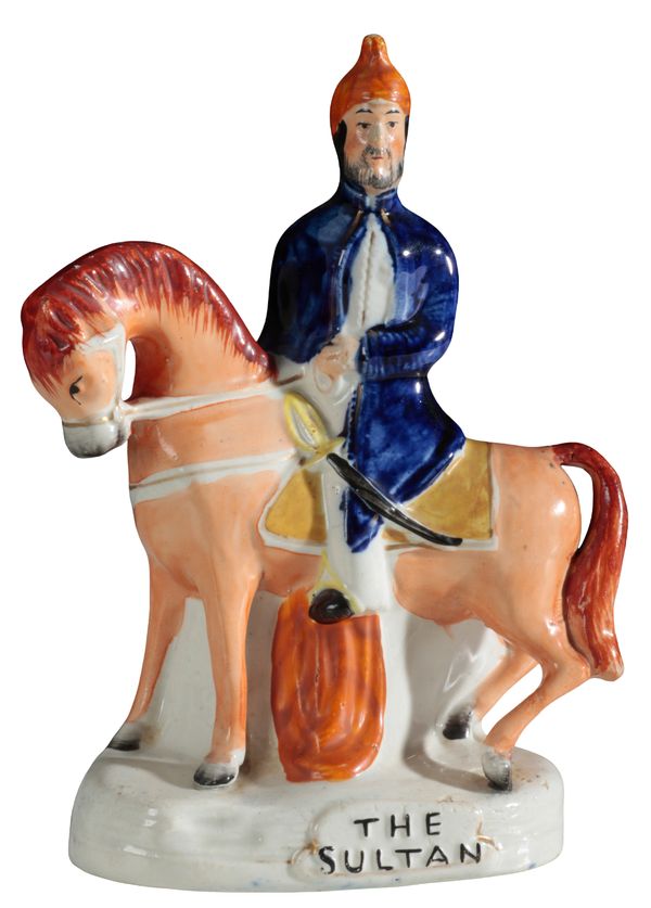 A VICTORIAN STAFFORDSHIRE POTTERY FIGURE, ‘THE SULTAN’