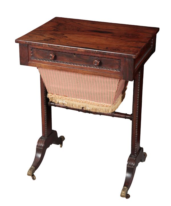 A REGENCY ROSEWOOD WORK TABLE