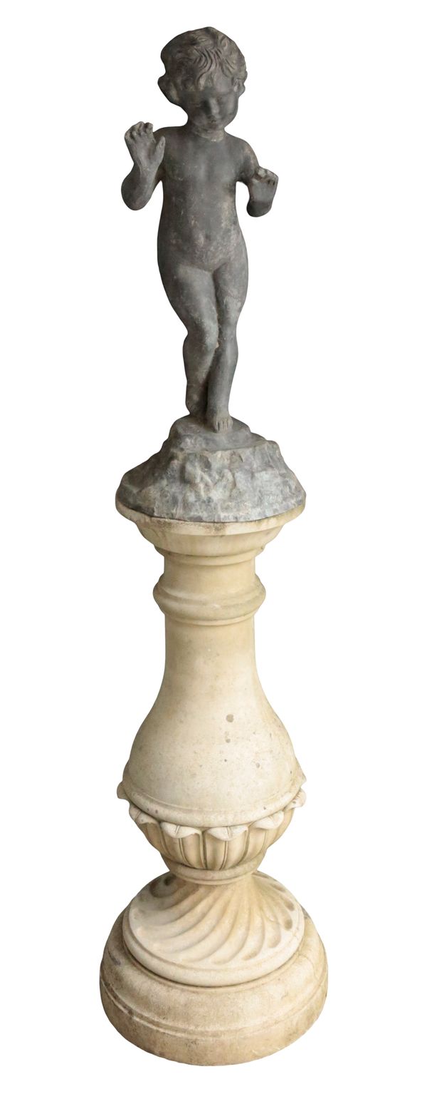 A LEAD PUTTO ON A HADDONSTONE STAND