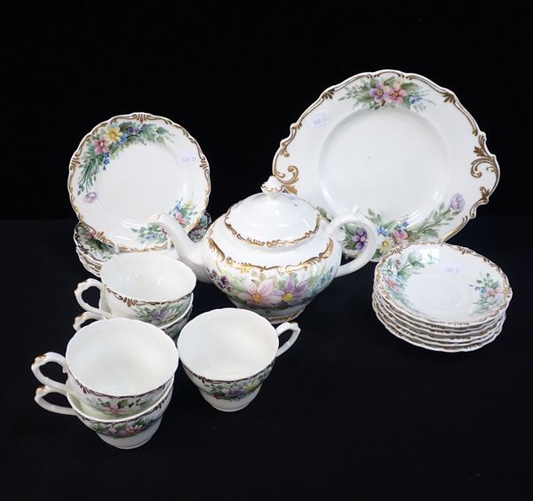 A PART TEA SET, HAND PAINTED AND GILT BY E.V. WHITAKER