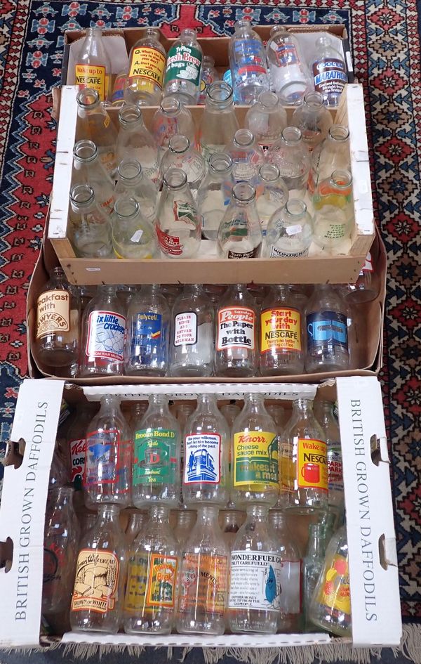 A  LARGE COLLECTION OF ADVERTISING MILK BOTTLES