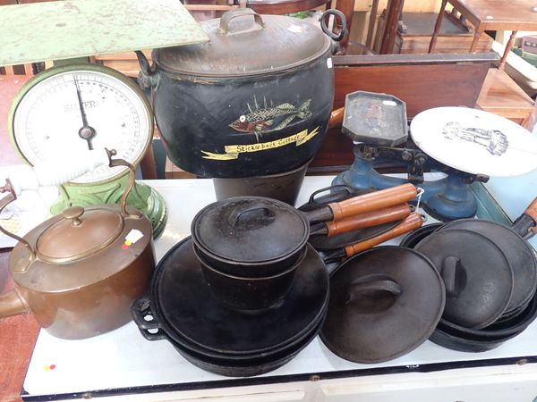 A SET OF CAST-IRON PANS, KITCHEN SCALES