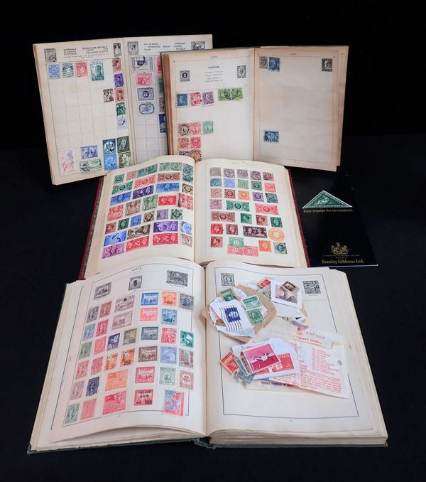 FOUR STAMP ALBUMS