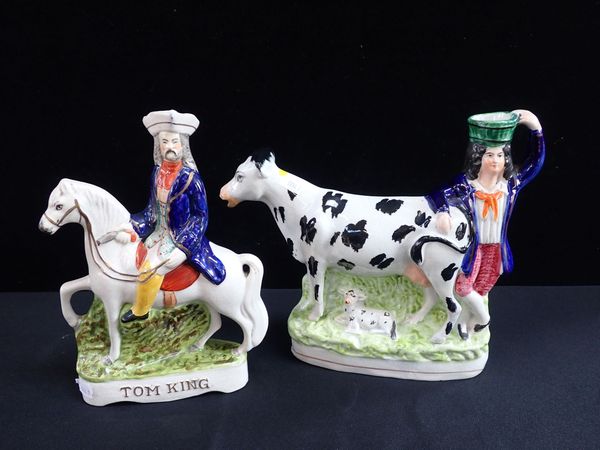 A 19TH CENTURY STAFFORDSHIRE POTTERY OVERSIZE COW CREAMER