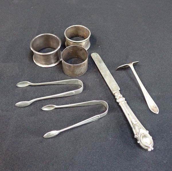 THREE SILVER NAPKIN RINGS AND OTHER ITEMS