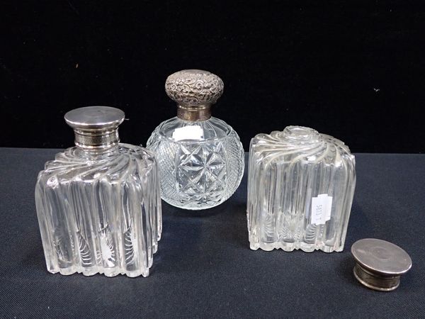 A PAIR OF SILVER-TOPPED DRESSING TABLE BOTTLES