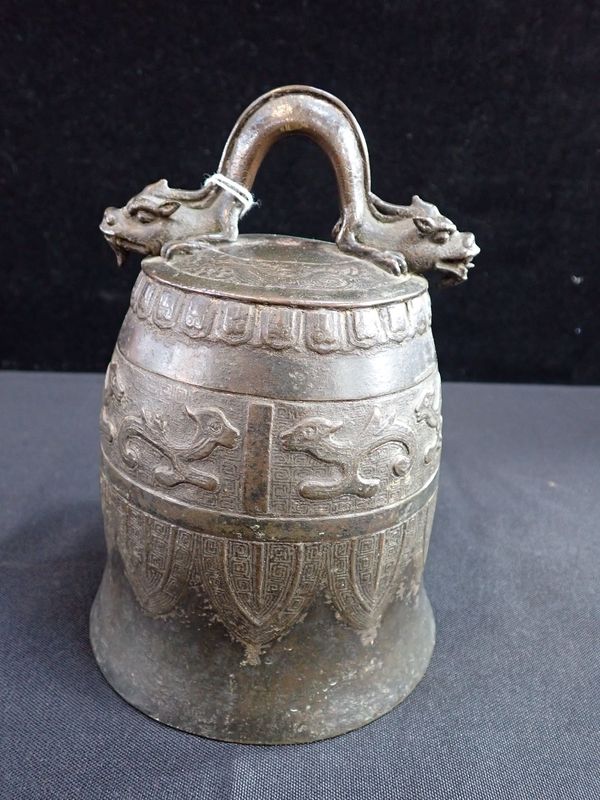 A CHINESE OR TIBETAN BRONZE BELL