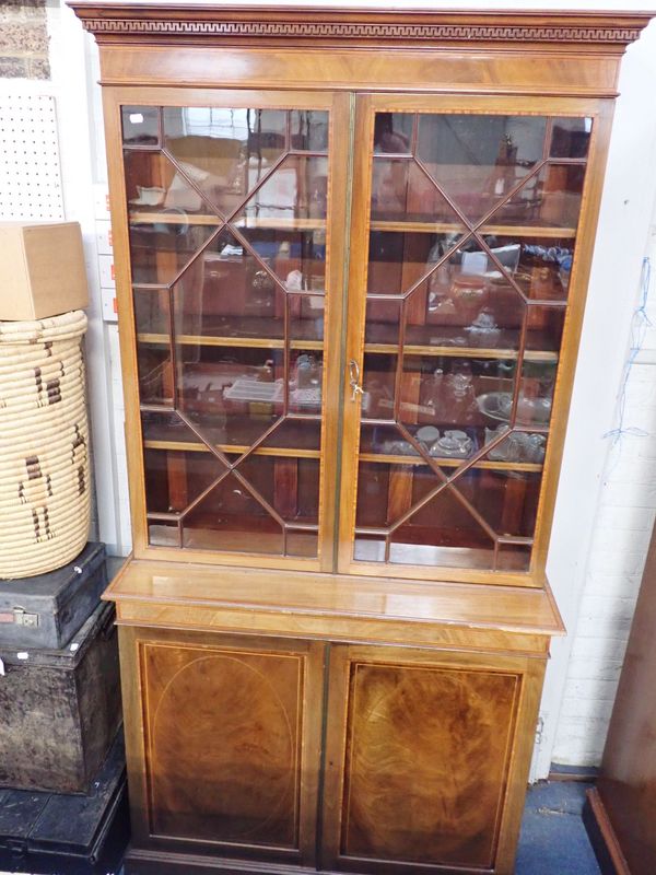 AN EDWARDIAN MAHOGANY LIBRARY BOOKCASE