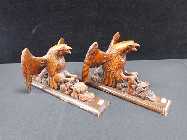 A PAIR OF JAPANESE WOOD CARVINGS OF EAGLES IN FLIGHT