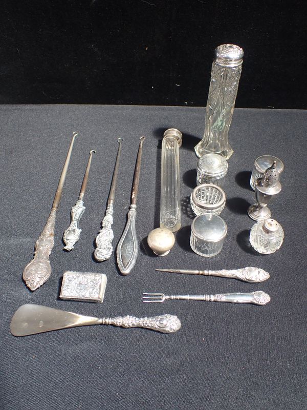 A COLLECTION OF SILVER AND WHITE METAL DRESSING JARS , A SHAKER