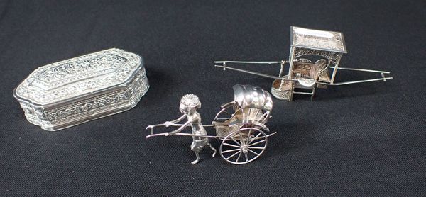 A CHINESE WHITE METAL MODEL OF A RICKSHAW