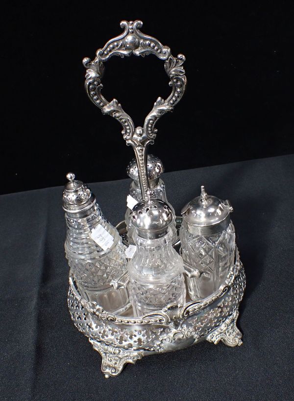 A CRUET SET WITH SILVER TOPPED BOTTLES