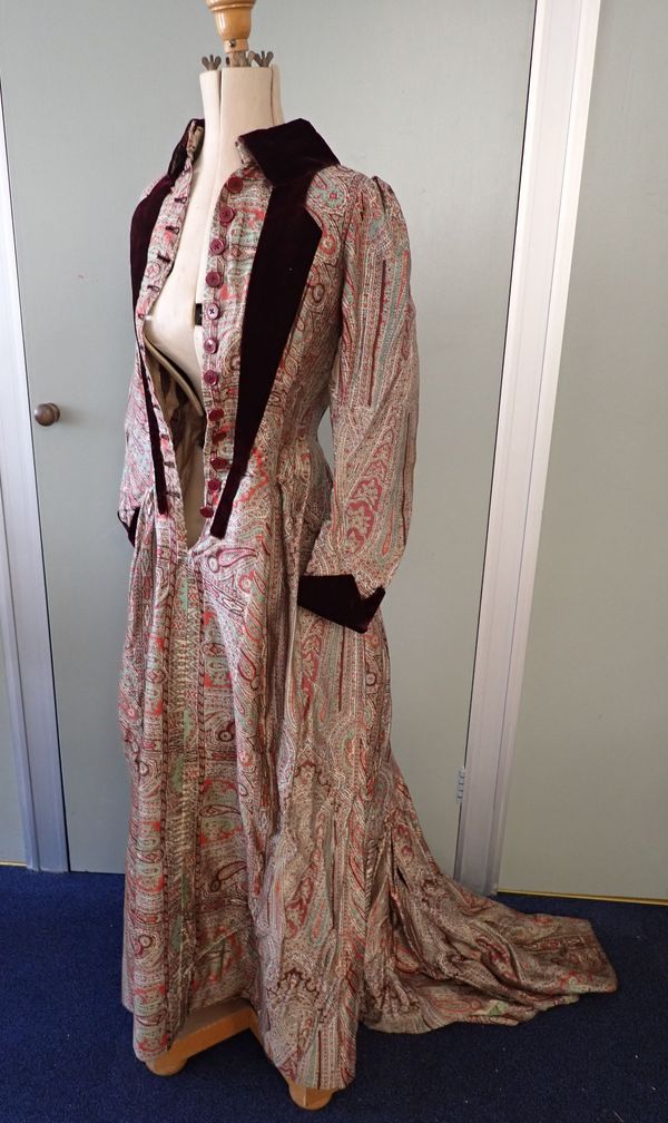 A 19TH CENTURY PAISLEY SILK AND VELVET DAY DRESS