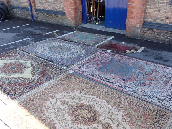 AN OLD MESHAD RUG (MOTH DAMAGED)