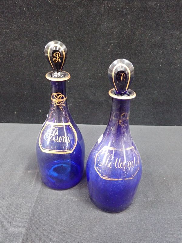 A PAIR OF BRISTOL BLUE GLASS DECANTERS