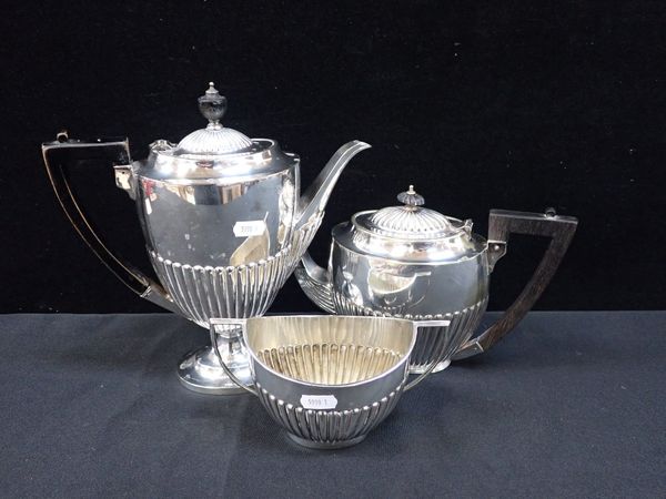 A MATCHED SILVER-PLATED THREE PIECE TEA SERVICE