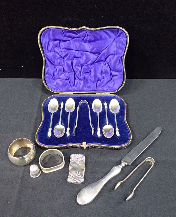 A CASED SET OF GEORGE V SILVER APOSTLE TEASPOONS